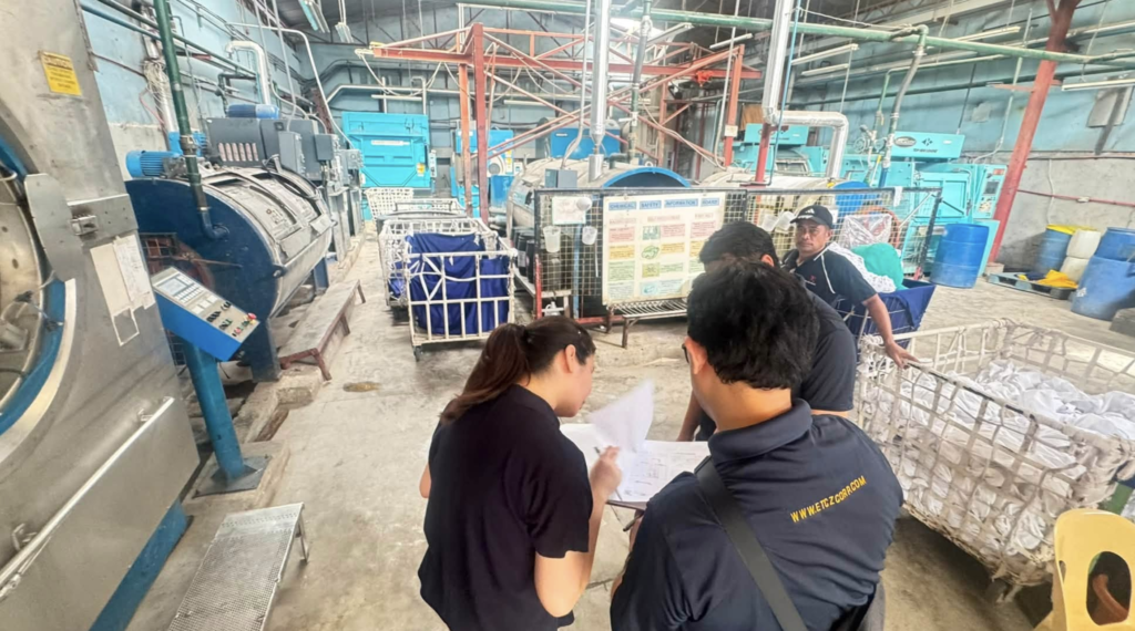etcz electricians checking industrial laundry facility